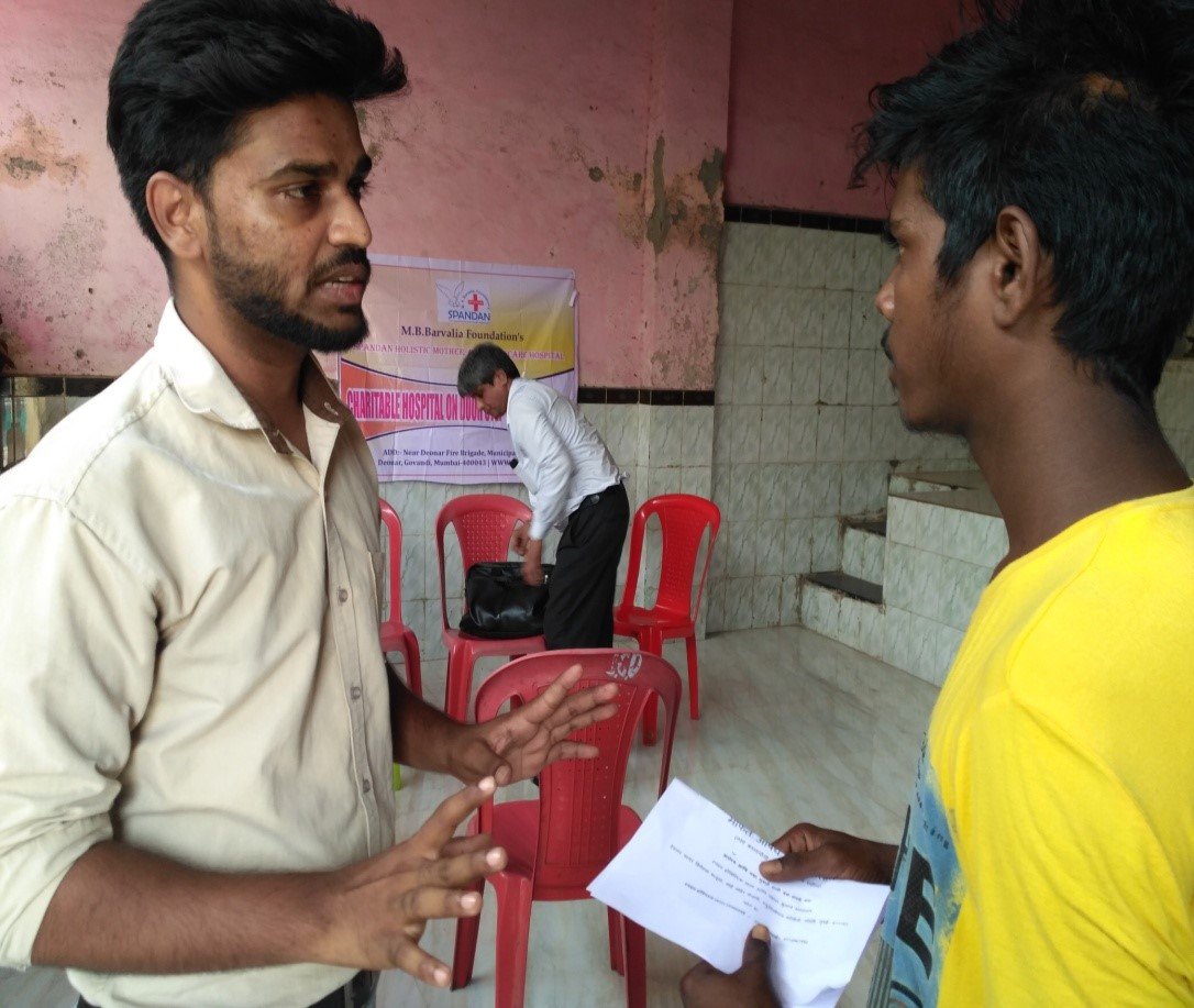 Medical camp-social worker interacting with addict